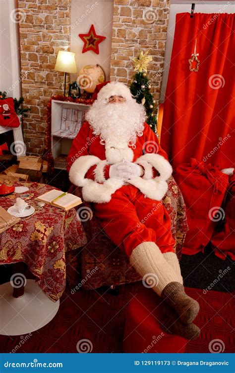 Traditional Santa Claus Santa Claus Sleeping In The Living Room Stock