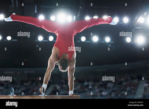 Male Gymnast Performing Handstand On Hi Res Stock Photography And