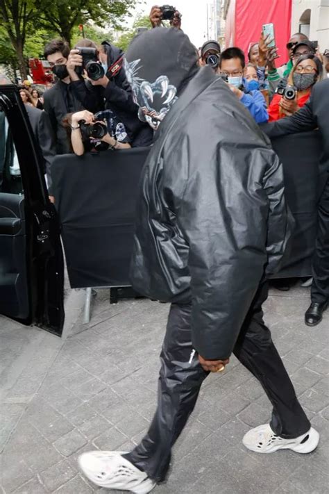 Kanye West Goes Undercover In Black Balaclava At Paris Fashion Week