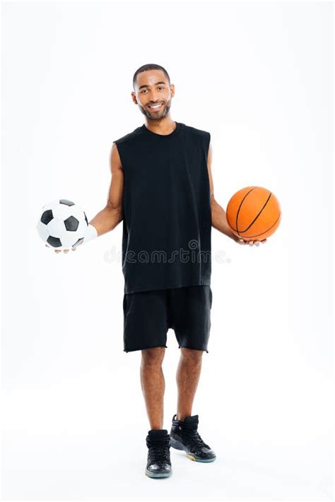 Happy African Sports Man Holding Basketball And Soccer Ball Stock Image