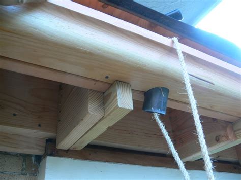 Put your downspout extension and connector together before placing on your gutter. Wood Gutters | NeilTortorella.com