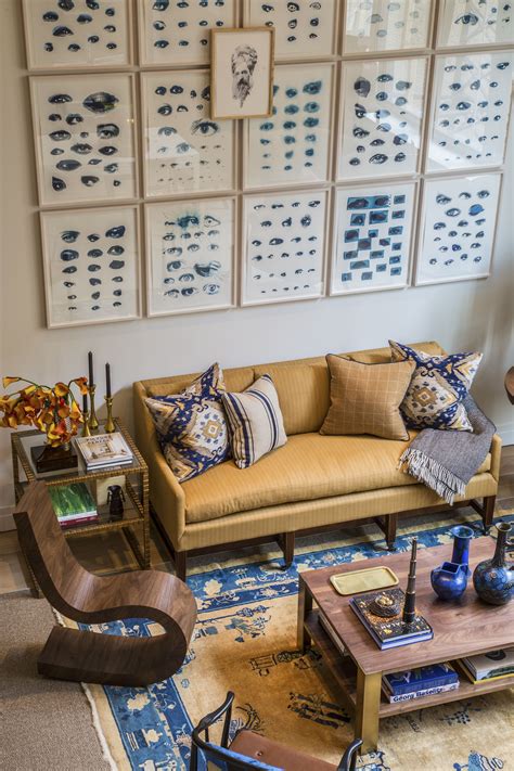 The Eclectic Living Rooms Focal Point Is The Silkscreen Eye Charts On