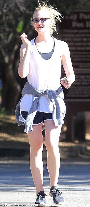 Elle Fanning Shows Off Porcelain Complexion As She Goes Make Up Free