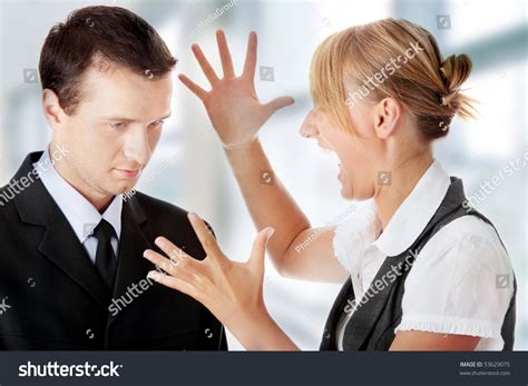 Work Colleagues Arguing On White Background Stock Photo 53629075