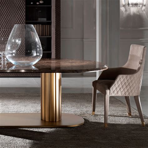 This depends heavily on the design of the rest of the house. Contemporary Italian Large Oval Marble Dining Table
