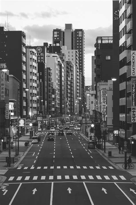 Grayscale Photo Of City Buildings · Free Stock Photo