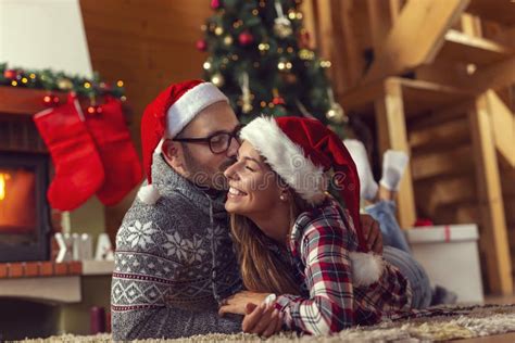 Christmas Morning Kiss Stock Image Image Of Fireplace 125940903