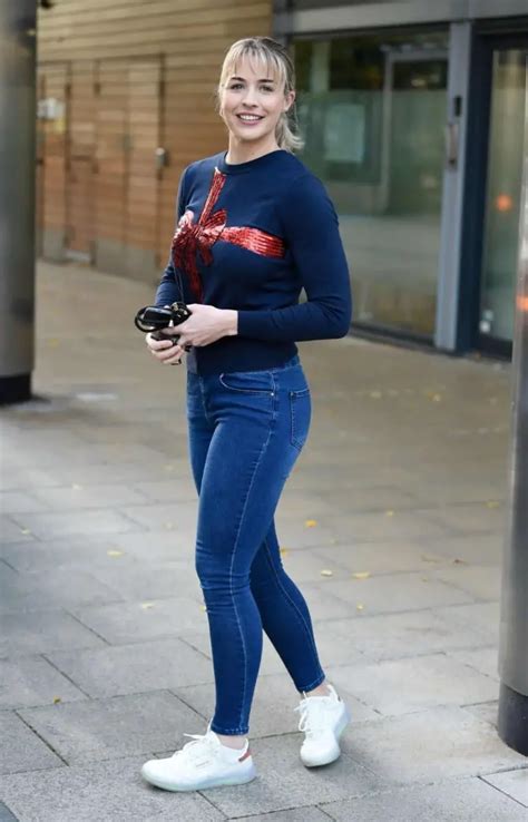 gemma atkinson looked chic in tight jeans and a festive sweater with a bow