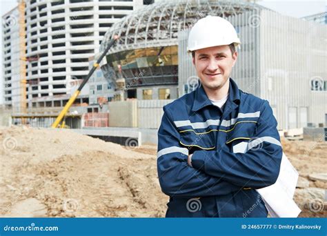 Foreman At Construction Site With Working Drawings Stock Image Image