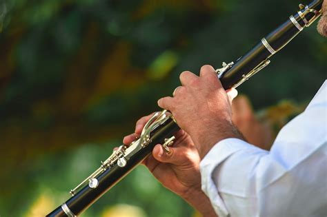 Free Photo Woman Playing A Clarinet In Music School