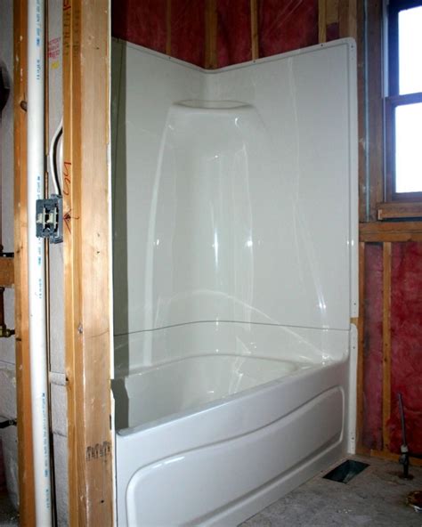 The cost of installation and replacement. Bathtubs and Surrounds: Refinish or Replace - Buildipedia