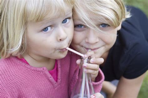 Two Young Girls Sharing Stock Image Image Of Pink Blond 19601545