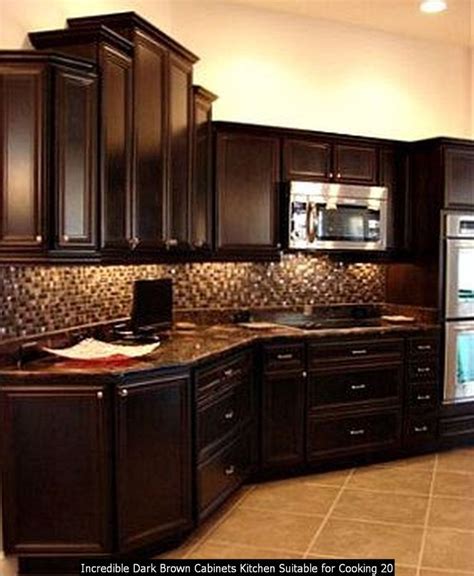 A Kitchen With Dark Wood Cabinets And Tile Flooring
