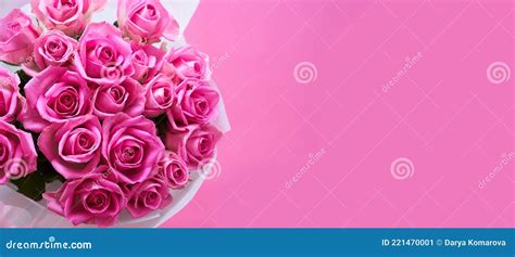 A Bouquet Of Pink Roses On A Pink Background A Banner Stock Image