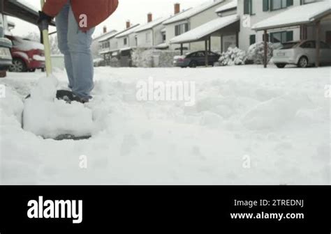 Slow Motion Close Up Dof Shoveling Manually White Snow From The Street
