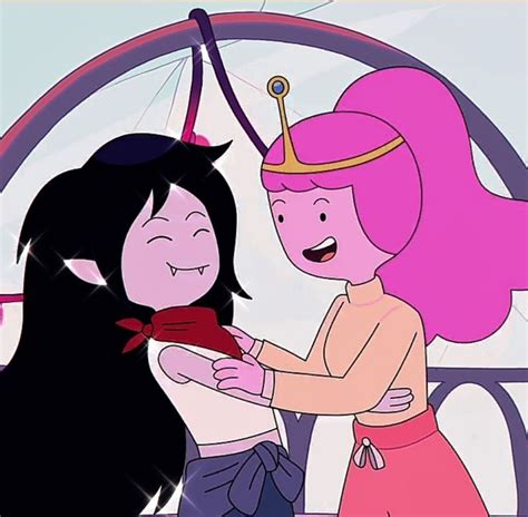 An Animated Image Of Two Women With Pink Hair One Wearing A Tiara And