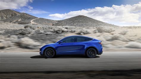 Teslas Elon Musk Unveils Model Y Crossover With 47000 Price Tag
