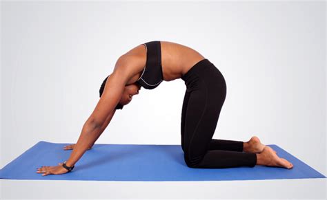 Athletic Woman Doing Yoga Pose To Stretch Back