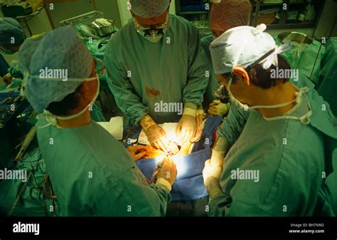 A Surgeon Performs Open Heart Surgery During A Procedure At The Private