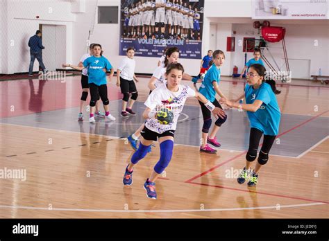 Children Playing Handball Dribling Stock Photo Alamy