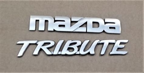 Mazda Tribute Rear Hatch Emblems Oem 2 Pieces Ebay