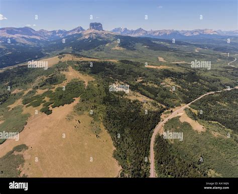 Aerial View To West Of Chief Mountain And The Rocky Mountain Front From