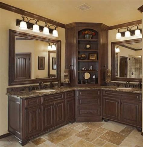 Beautiful mosaic accents give the space a touch of luxury. Corner bathroom sink vanity with some light and also ...