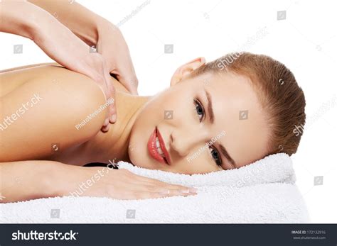 Young Beautiful Caucasian Woman Lying On A Massage Table