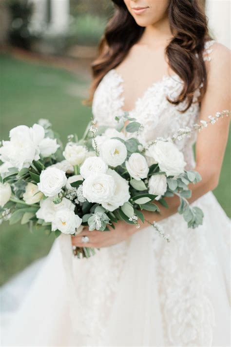 Their wedding was captured beautifully by nick tucker. White peony, ranunculus and rose bridal bouquet | The Inn ...