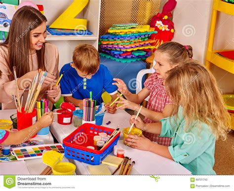 Children And Teacher Are Engaged In Education Creative Activities Stock Image Image Of