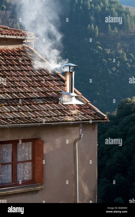 Smoke Coming From Chimney In A House In St Martial Medieval Village