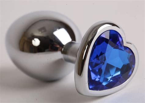Серебристая анальная пробка с синим кристаллом сердцем 9 см