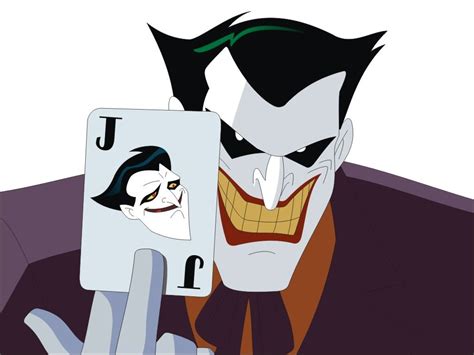 The Joker Is Holding Up A Card In Front Of His Face