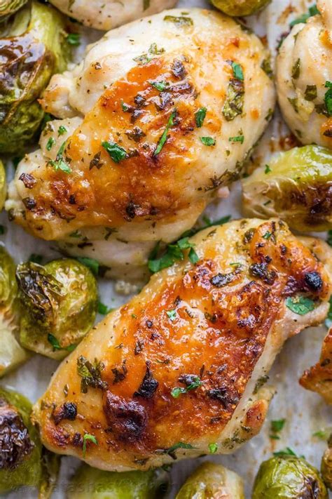 Season the chicken with the seasonings listed and massage it in thoroughly. Baked Chicken thighs on sheet pan with a flavorful garlic ...