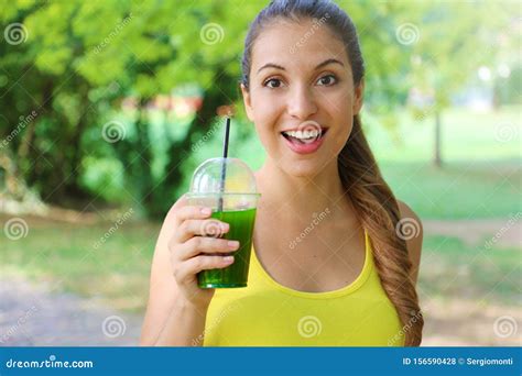 Young Beautiful Sporty Woman Drinking Green Detox Smoothie Fitness Girl Drinking Vegetable