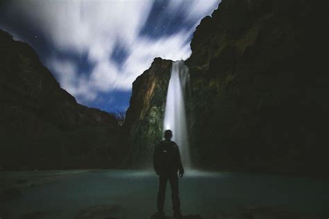 Man Standing Front Waterfalls People Water Falls Clouds Sky