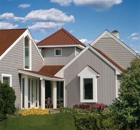 This Is An Artists Rendering Of The Exterior Of A House With Gray