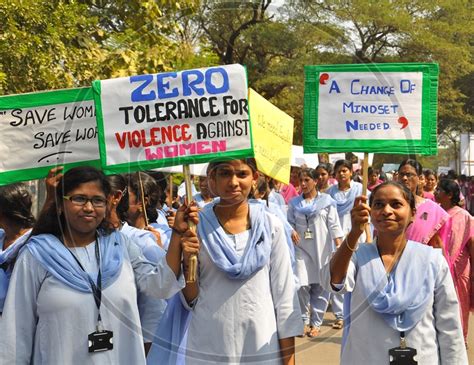 Image Of Indian School Girls Holding Placards On Poem About Women