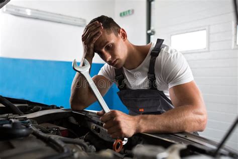 Worried Repairman In A Workshop Stock Image Image Of Automobile