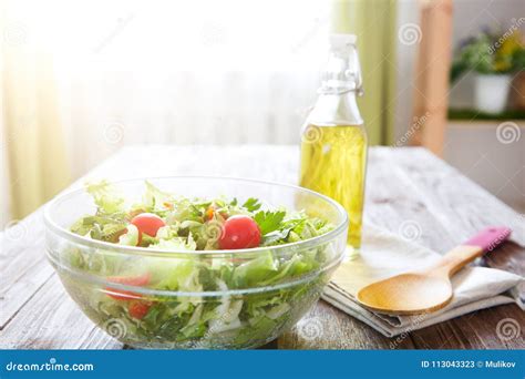 Tasty Salad In A Bowl On Wooden Table Concept Healthy Lifestyle And