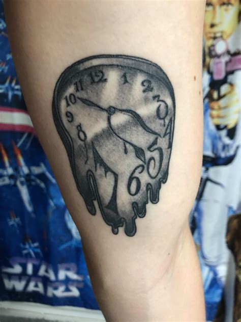 Melting Clock Tattoo Designs
