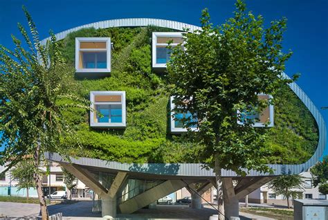 Lush Green Walls Sandwich Pioneering Net Zero Energy Building In Spain