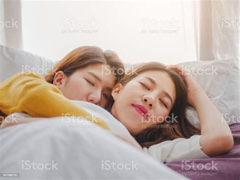 Young Asian Woman Lesbian Lovers Sleep On Bedroom At Home Lesbian