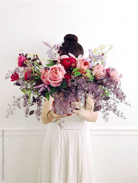 Woman Holding Bouquet Of Flowers By Daniel Kim Photography Stocksy United