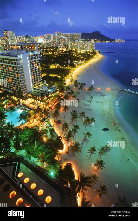 Overview Of Waikiki Beaches With Diamond Head At Twilight Stock Photo