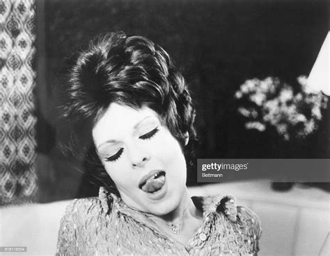 Actress Dolly Sharp Licking Her Lips In Scene From The 1972 Photo D
