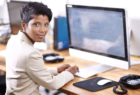 Premium Photo Shes A Very Diligent Worker Portrait Of An Attractive Businesswoman Working On A