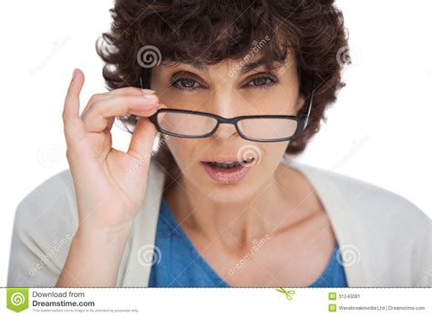 Portrait Of A Shocked Woman Looking Over Her Glasses Stock Image