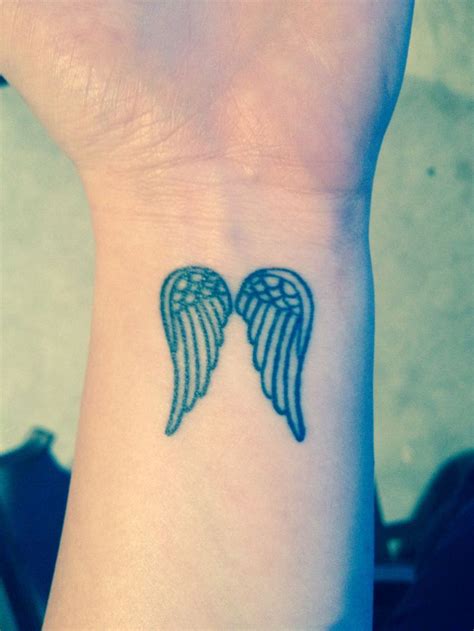 Left Wrist Small Angel Wings Tattoos