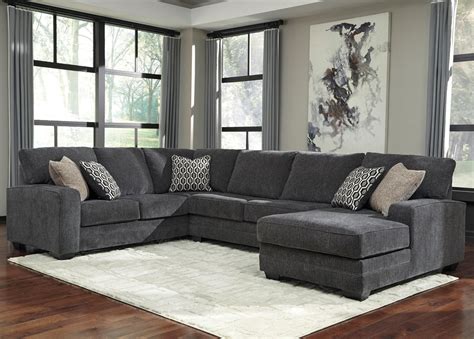 Refreshing and modern, this sofa sectional features soft, reclining seats and a convenient center console. Benchcraft Tracling Contemporary Sectional with Right ...
